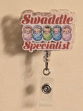 Swaddle badge reel