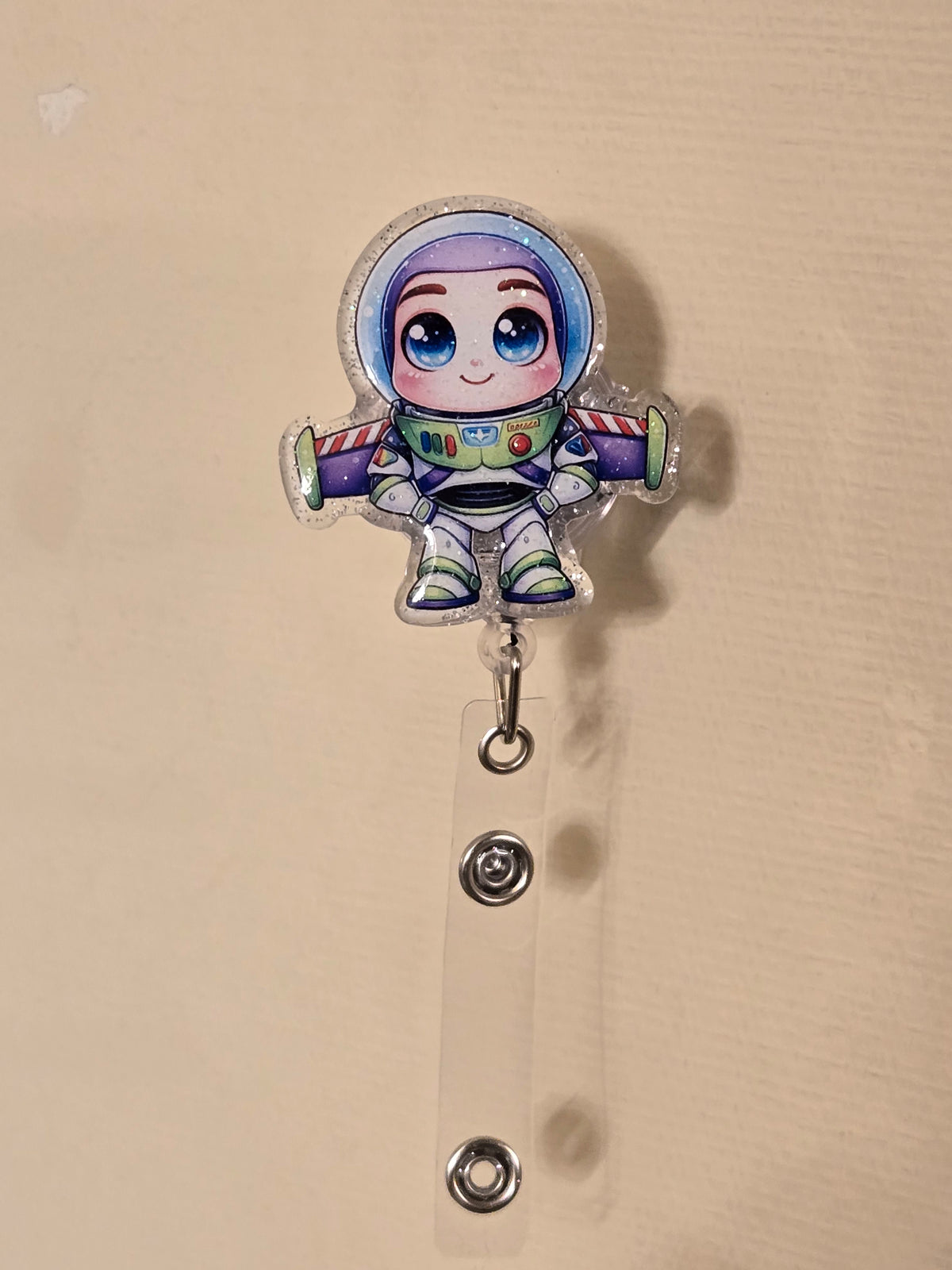 Spaceman badge reel